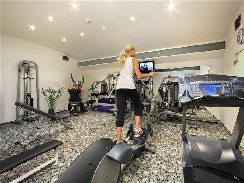 Hotel Paris Prague Exterior photo A woman on a cross trainer